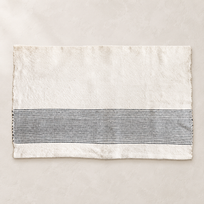 Riviera Handwoven Cotton Bath Mat — studio view